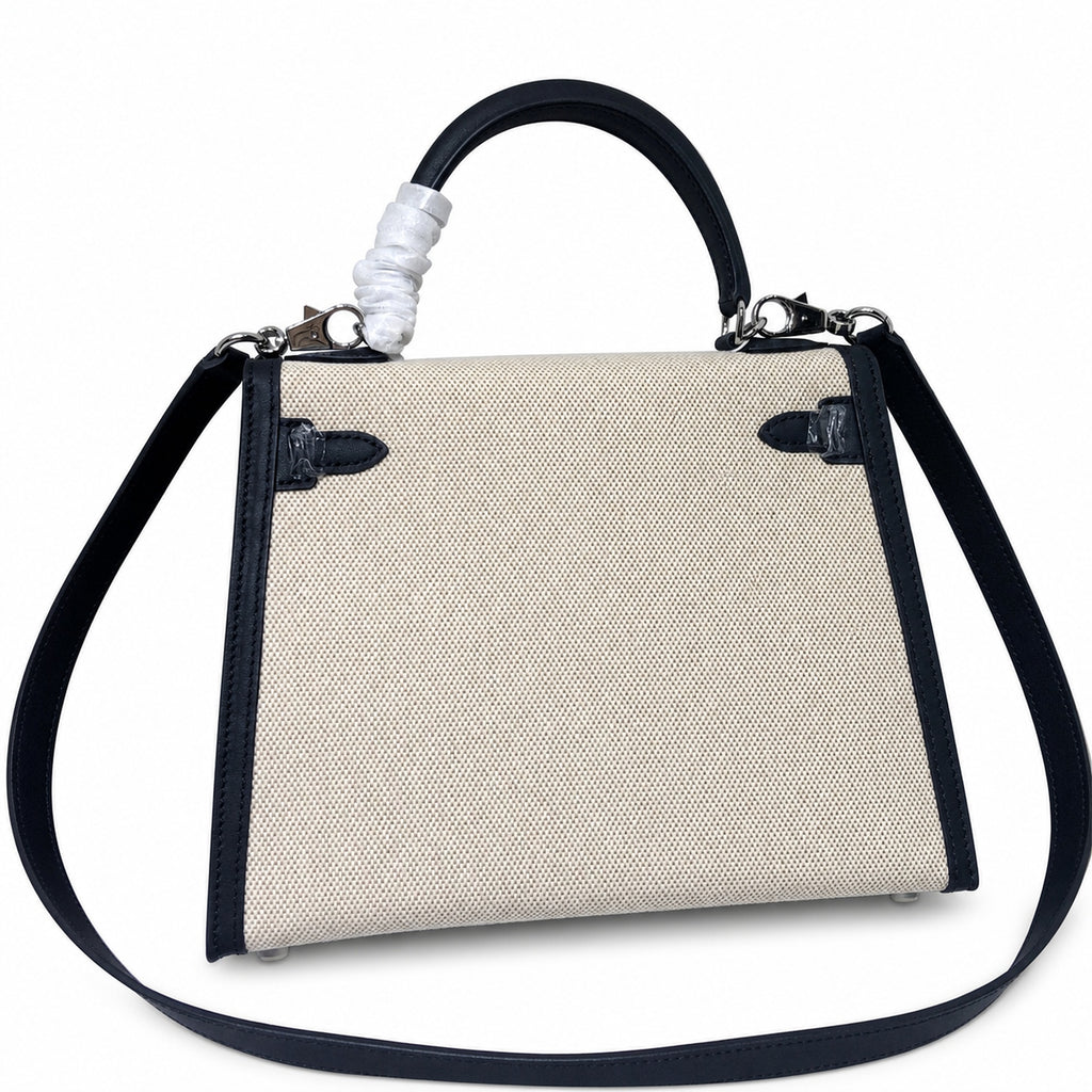 Top Selling Kelly 25 Bag With Outside Stitching, Made Of Textured Canvas & Soft Swift Leather Patchwork, Classic Black Silver Hardware Combination, Stunning Mixed Material Texture Dimensions: Length 25 * Width 10 * Height 18cm