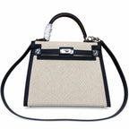 Top Selling Kelly 25 Bag With Outside Stitching, Made Of Textured Canvas & Soft Swift Leather Patchwork, Classic Black Silver Hardware Combination, Stunning Mixed Material Texture Dimensions: Length 25 * Width 10 * Height 18cm