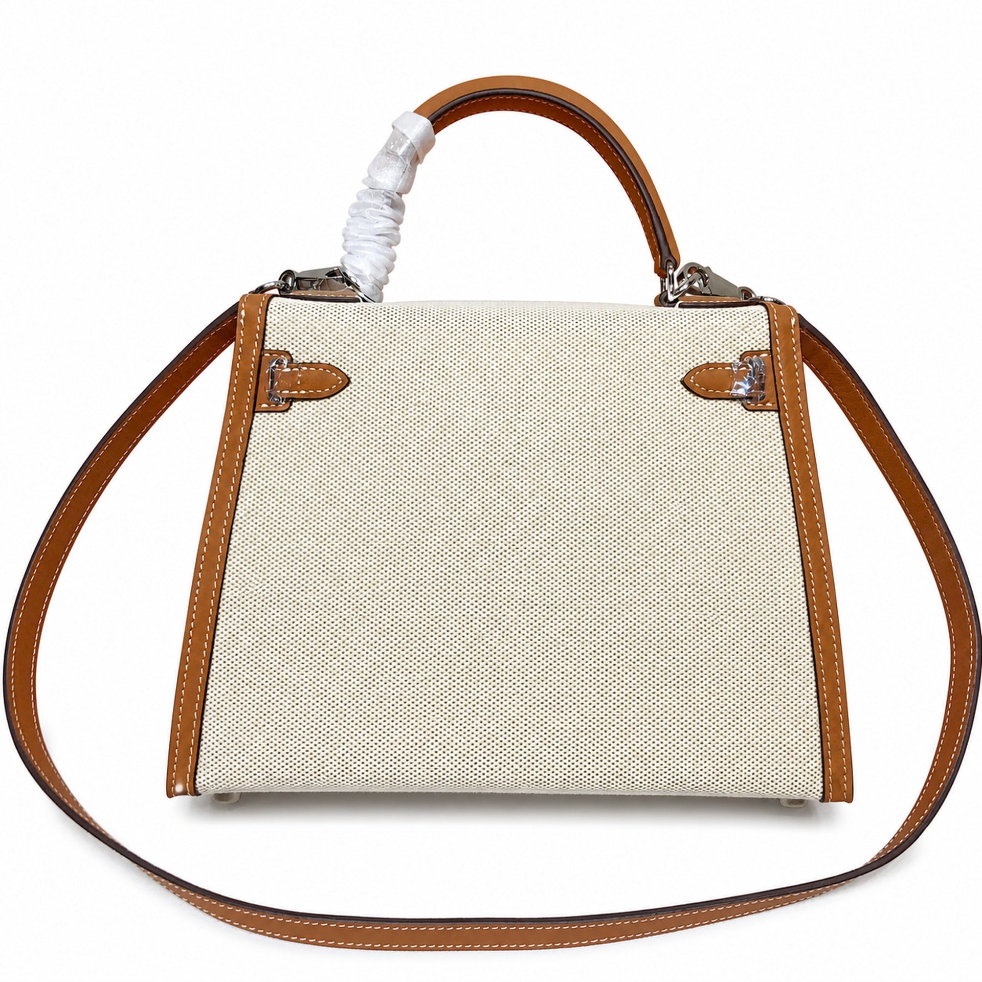 Kelly 25 Bag With Outside Stitching Constructed Of Patchwork Canvas & Premium Soft Swift Leather, Rich Warm Brown Tone Delivers Full-Bodied Vintage Luxury Texture Dimensions: Length 25 * Width 10 * Height 18cm