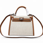 Kelly 25 Bag With Outside Stitching Constructed Of Patchwork Canvas & Premium Soft Swift Leather, Rich Warm Brown Tone Delivers Full-Bodied Vintage Luxury Texture Dimensions: Length 25 * Width 10 * Height 18cm