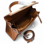 Kelly 25 Bag With Outside Stitching Constructed Of Patchwork Canvas & Premium Soft Swift Leather, Rich Warm Brown Tone Delivers Full-Bodied Vintage Luxury Texture Dimensions: Length 25 * Width 10 * Height 18cm
