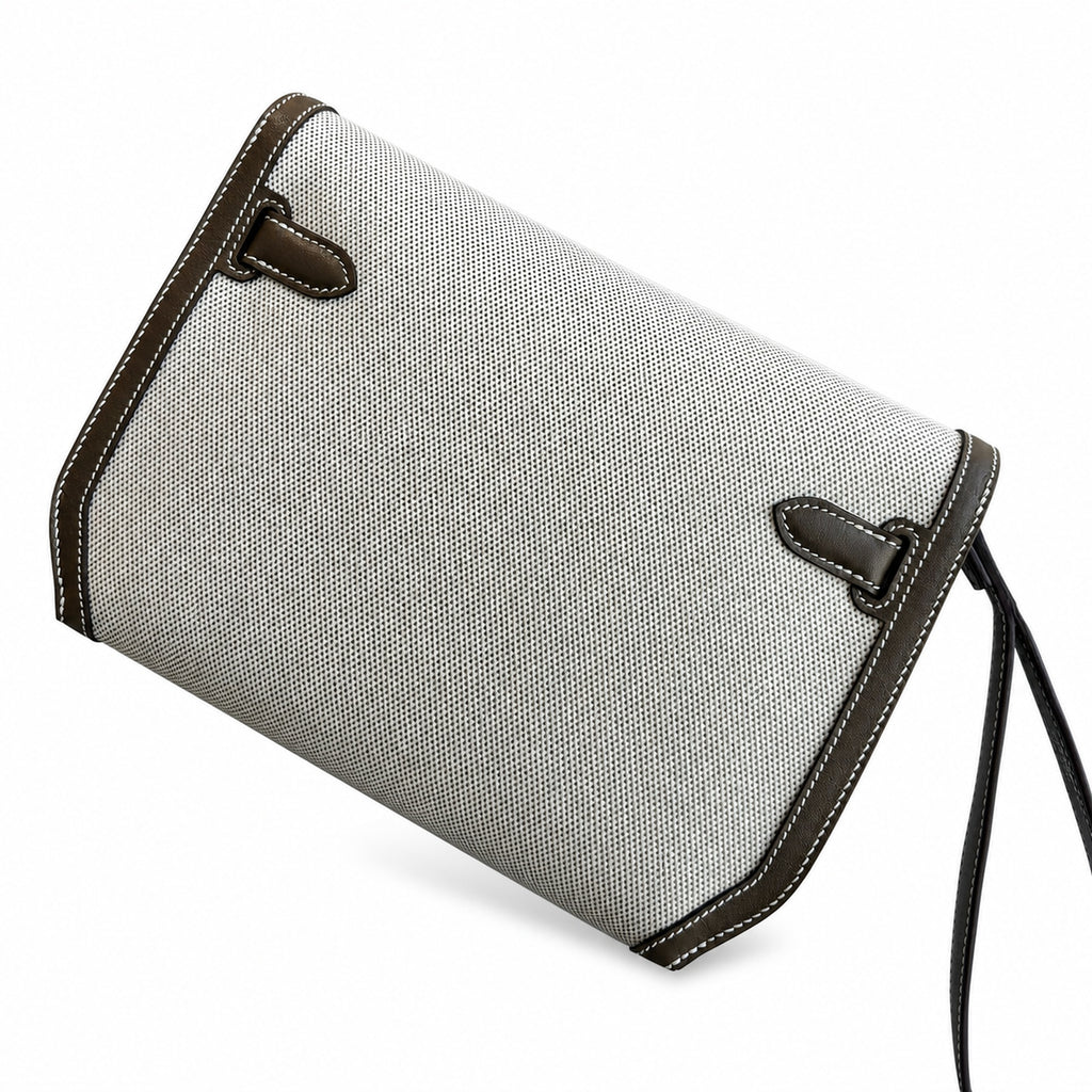 Kelly Depeches 25 clutch, canvas and swift leather (with additional shoulder strap), can be carried cross-body, can be carried by hand or on the wrist, daily needs, seamless switching between business
