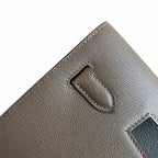 Kelly Depeches 25 clutch, Evercolor leather (with additional shoulder strap), can be worn cross-body, can be carried by hand or on the wrist, daily needs, seamless switch between business/leisure - ce