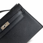 First generation handbag evening bag Kelly 22cm Epsom leather black silver buckle wax thread