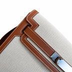 Kelly Depeches 25 clutch, canvas and swift leather (with additional shoulder strap), can be carried cross-body, can be carried by hand or on the wrist, daily needs, seamless switching between business