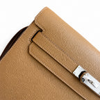 Kelly Depeches 25 clutch, Togo leather (with additional shoulder strap), can be worn cross-body, can be carried by hand or on the wrist, daily needs, seamless switch between business/leisure - central