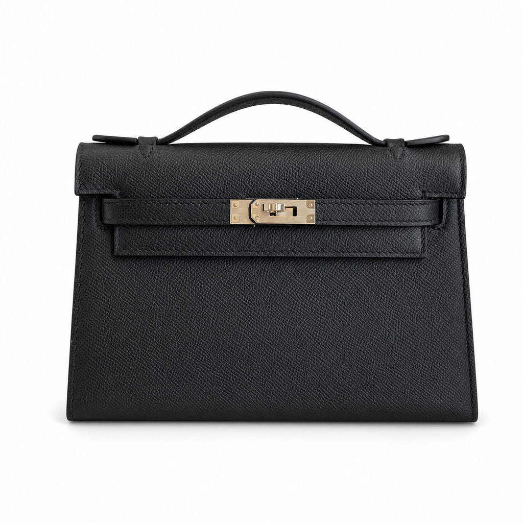First generation handbag evening bag Kelly 22cm Epsom leather black silver buckle wax thread