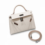 Style: mini kelly Color: ck10/craie Size: 19*12*5.5cm Leather: epsom From France Hardware: silver Mini Kelly second generation, milkshake white, French imported cowhide, silver buckle, high-end handma