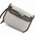 Kelly Depeches 25 clutch, canvas and swift leather (with additional shoulder strap), can be carried cross-body, can be carried by hand or on the wrist, daily needs, seamless switching between business