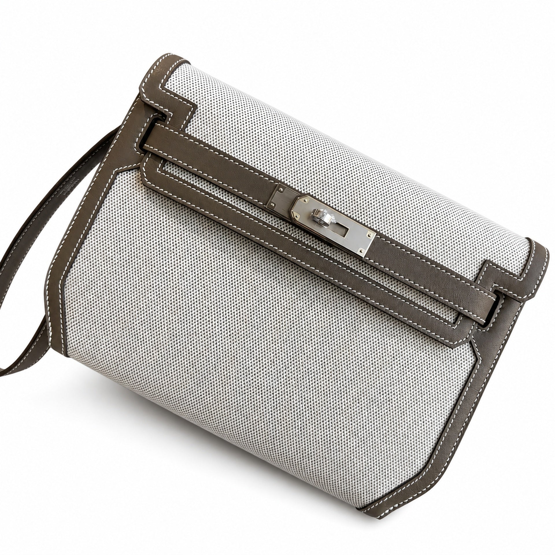 Kelly Depeches 25 clutch, canvas and swift leather (with additional shoulder strap), can be carried cross-body, can be carried by hand or on the wrist, daily needs, seamless switching between business