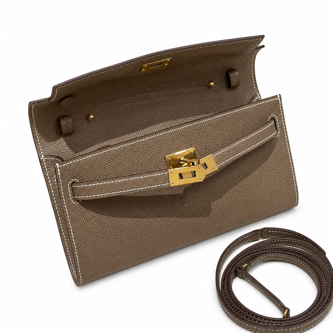 Style: Kelly to go Color: ck18/etoupe Size: 19*11.5*1.5cm Leather: epsom From France Hardware: gold Kelly shoulder crossbody bag, elephant gray, cowhide, gold buckle, high-end handmade exclusive custo