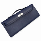 Kelly cut clutch, evening bag, epsom leather, waxed thread hand-stitching, sapphire blue, silver buckle