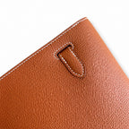 Kelly Depeches 25 clutch, Togo leather (with additional shoulder strap), can be worn cross-body, can be carried by hand or on the wrist, daily needs, seamless switch between business/leisure - central