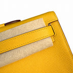 Kelly cut clutch, evening bag, epsom leather, wax thread hand-sewing, amber yellow, gold buckle