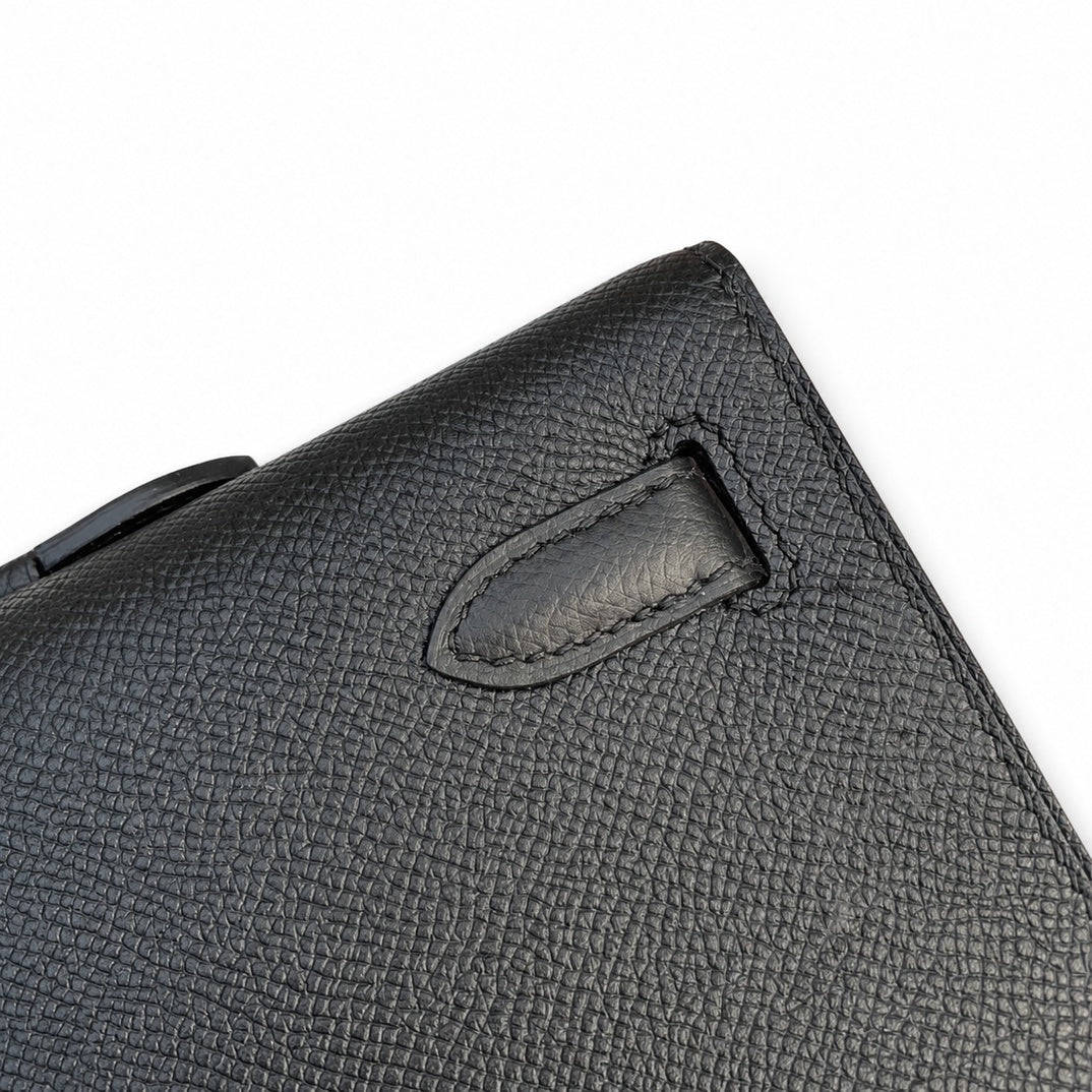 Kelly cut clutch evening bag epsom leather wax thread hand-stitched black gold buckle