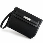 Kelly Depeches 25 clutch, canvas and swift leather (with additional shoulder strap), can be carried cross-body, can be carried by hand or on the wrist, daily needs, seamless switching between business