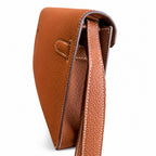 Kelly Depeches 25 clutch, Togo leather (with additional shoulder strap), can be worn cross-body, can be carried by hand or on the wrist, daily needs, seamless switch between business/leisure - central