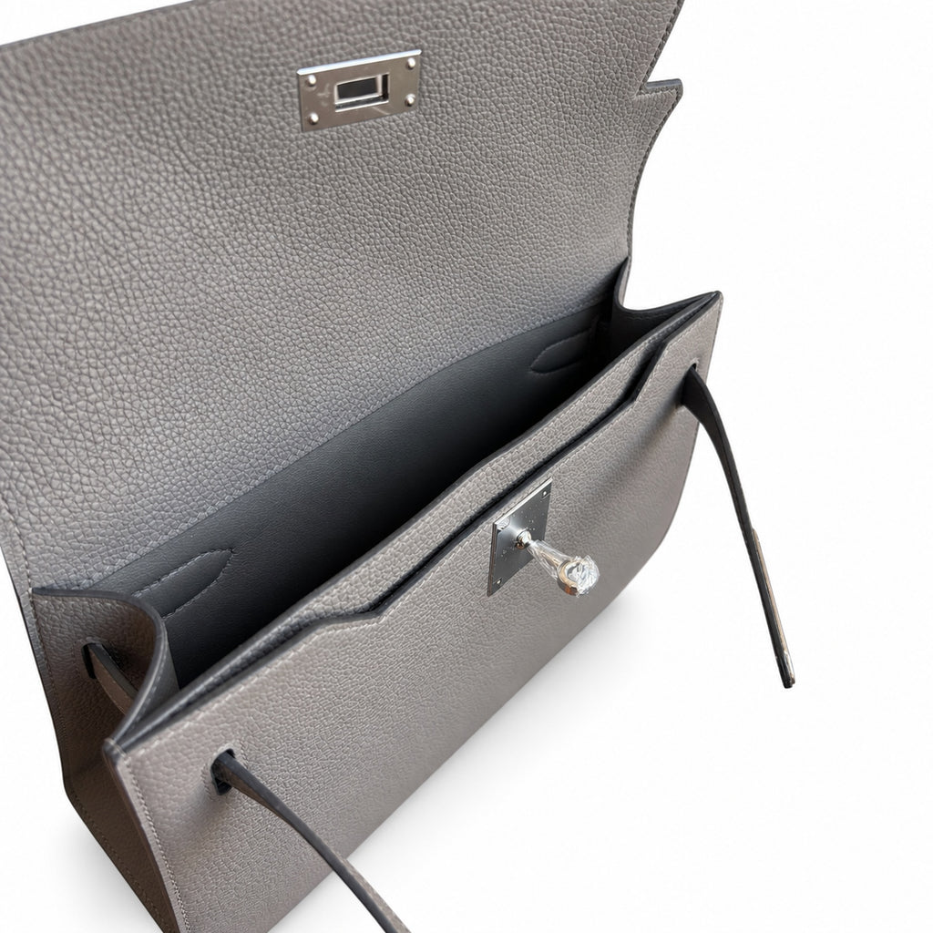 Kelly Depeches 25 clutch, Togo leather (with additional shoulder strap), can be worn cross-body, can be carried by hand or on the wrist, daily needs, seamless switch between business/leisure - central