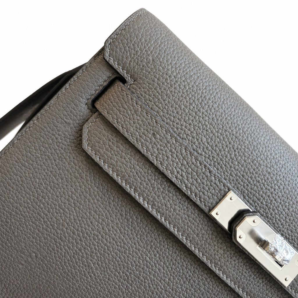 Kelly Depeches 25 clutch, Togo leather (with additional shoulder strap), can be worn cross-body, can be carried by hand or on the wrist, daily needs, seamless switch between business/leisure - central