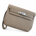 Kelly Depeches 25 clutch, Togo leather (with additional shoulder strap), can be worn cross-body, can be carried by hand or on the wrist, daily needs, seamless switch between business/leisure - central