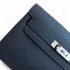 Kelly Depeches 25 clutch, Togo leather (with additional shoulder strap), can be worn cross-body, can be carried by hand or on the wrist, daily needs, seamless switch between business/leisure - central