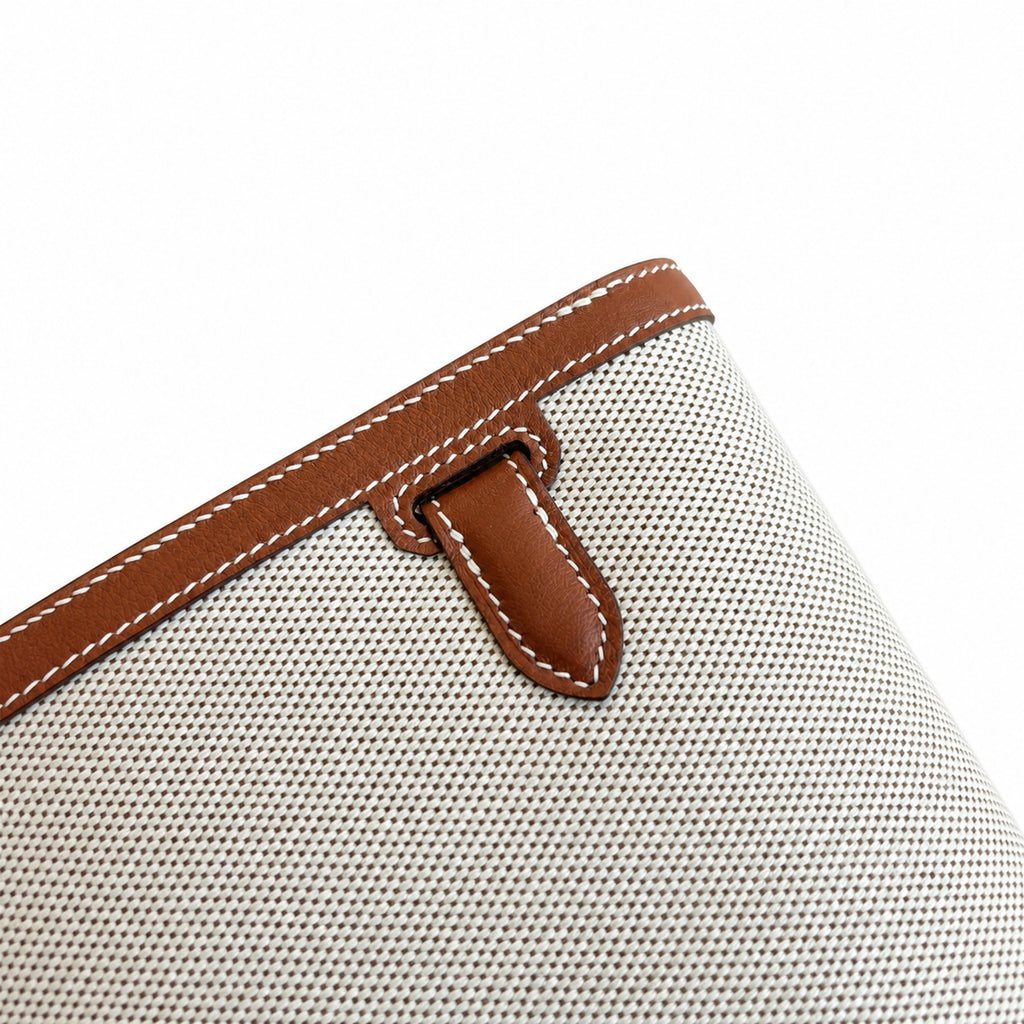 Kelly Depeches 25 clutch, canvas and swift leather (with additional shoulder strap), can be carried cross-body, can be carried by hand or on the wrist, daily needs, seamless switching between business