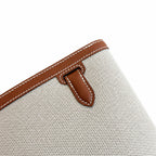Kelly Depeches 25 clutch, canvas and swift leather (with additional shoulder strap), can be carried cross-body, can be carried by hand or on the wrist, daily needs, seamless switching between business
