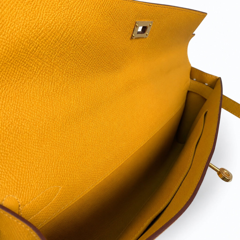 Kelly cut clutch, evening bag, epsom leather, wax thread hand-sewing, amber yellow, gold buckle