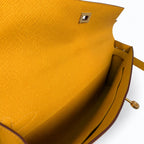Kelly cut clutch, evening bag, epsom leather, wax thread hand-sewing, amber yellow, gold buckle