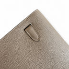 Kelly Depeches 25 clutch, Togo leather (with additional shoulder strap), can be worn cross-body, can be carried by hand or on the wrist, daily needs, seamless switch between business/leisure - central