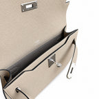 Kelly Depeches 25 clutch, Togo leather (with additional shoulder strap), can be worn cross-body, can be carried by hand or on the wrist, daily needs, seamless switch between business/leisure - central