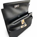 Kelly Depeches 25 clutch, canvas and swift leather (with additional shoulder strap), can be carried cross-body, can be carried by hand or on the wrist, daily needs, seamless switching between business