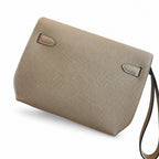 Kelly Depeches 25 clutch, Togo leather (with additional shoulder strap), can be worn cross-body, can be carried by hand or on the wrist, daily needs, seamless switch between business/leisure - central