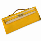 Kelly cut clutch, evening bag, epsom leather, wax thread hand-sewing, amber yellow, gold buckle