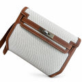 Kelly Depeches 25 clutch, canvas and swift leather (with additional shoulder strap), can be carried cross-body, can be carried by hand or on the wrist, daily needs, seamless switching between business