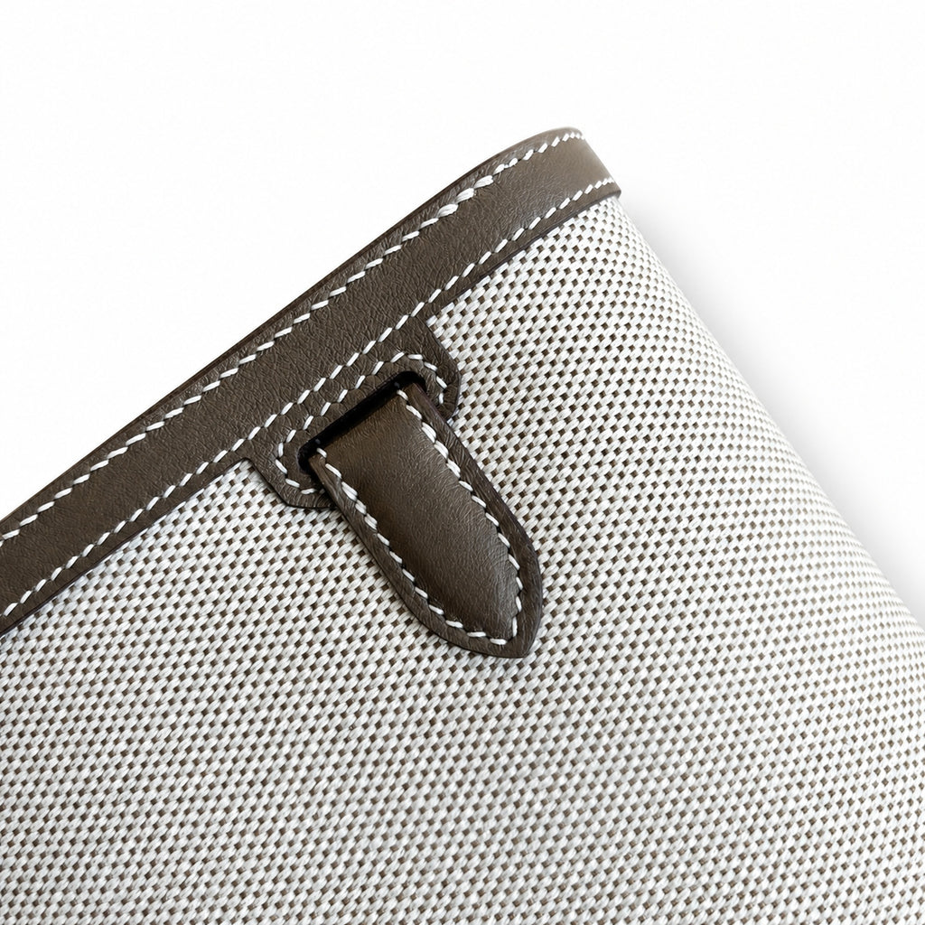 Kelly Depeches 25 clutch, canvas and swift leather (with additional shoulder strap), can be carried cross-body, can be carried by hand or on the wrist, daily needs, seamless switching between business