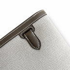 Kelly Depeches 25 clutch, canvas and swift leather (with additional shoulder strap), can be carried cross-body, can be carried by hand or on the wrist, daily needs, seamless switching between business