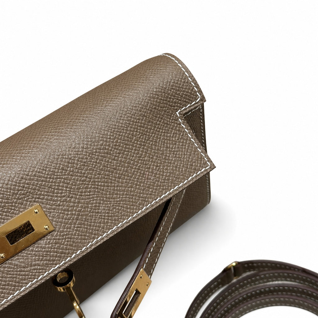 Style: Kelly to go Color: ck18/etoupe Size: 19*11.5*1.5cm Leather: epsom From France Hardware: gold Kelly shoulder crossbody bag, elephant gray, cowhide, gold buckle, high-end handmade exclusive custo