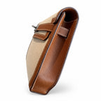 Kelly Depeches 25 clutch, canvas and swift leather (with additional shoulder strap), can be carried cross-body, can be carried by hand or on the wrist, daily needs, seamless switching between business